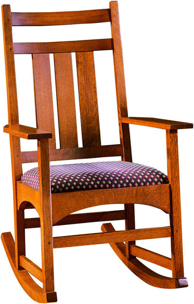 Wooden rocking chair with a patterned cushion on a white background
