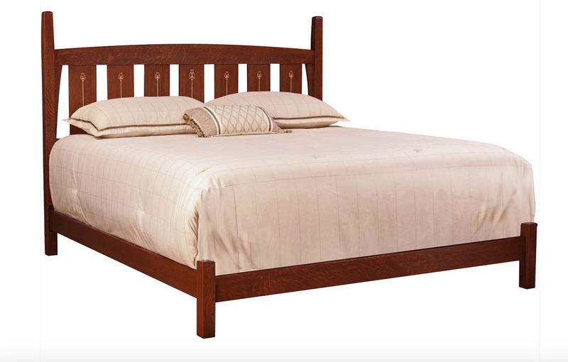 Harvey Ellis bed with beige bedding and a low footboard. 