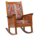 Wooden rocking chair with patterned cushion on a white background