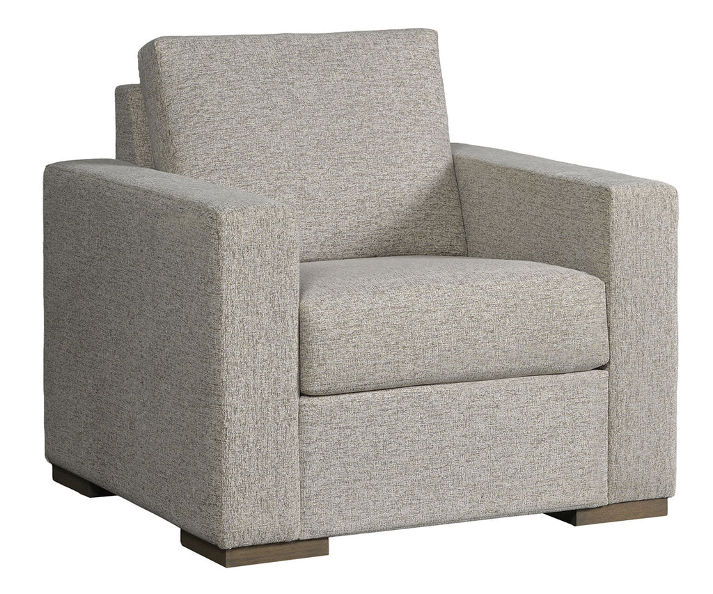 Gray upholstered armchair on a white background