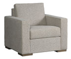 Gray upholstered armchair on a white background