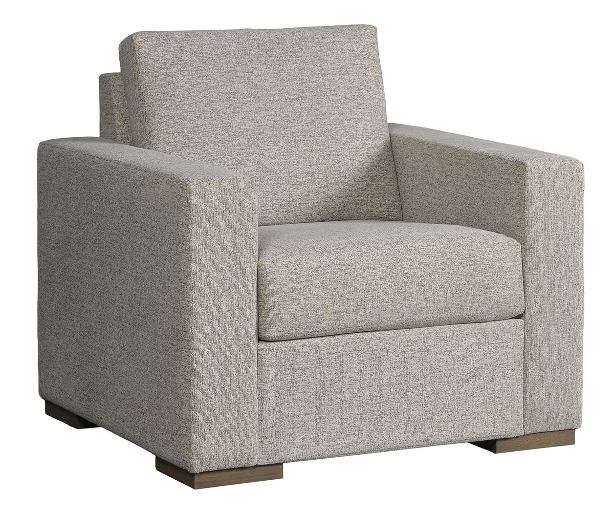 Gray upholstered armchair on a white background