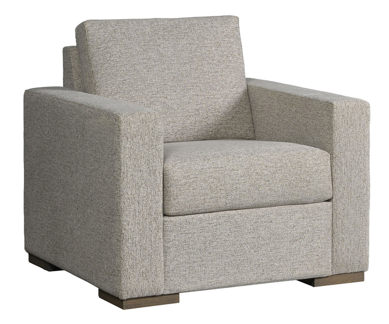 Gray upholstered armchair on a white background