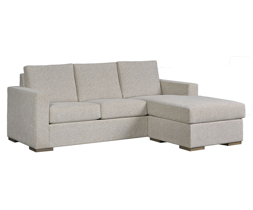 Beige sofa with chaise on a white background