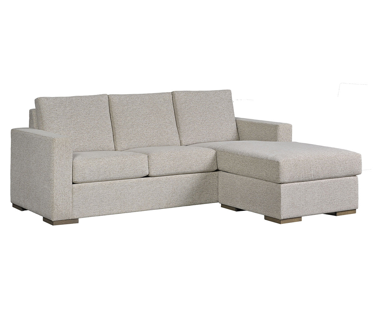Beige sofa with chaise on a white background