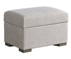 Gray textured storage ottoman on a white background