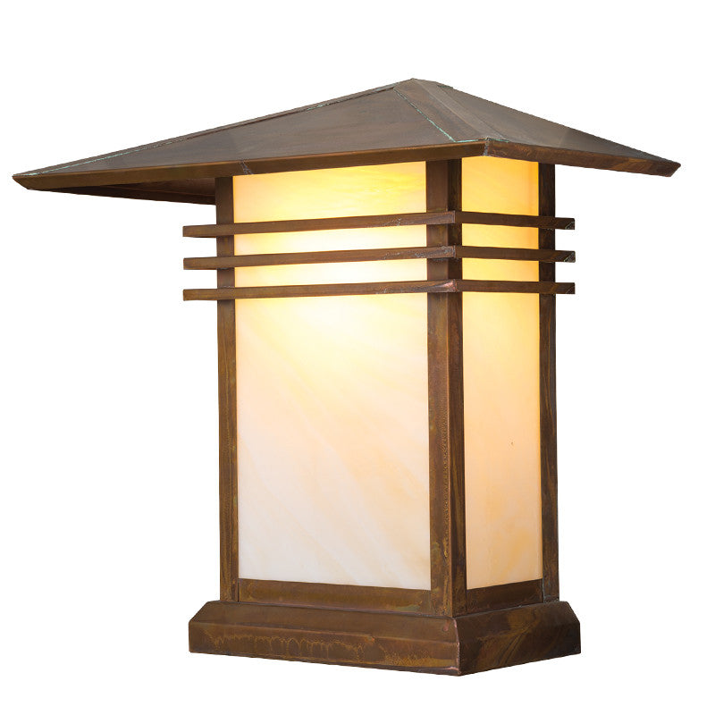 Wooden outdoor lantern with a warm glow on a white background