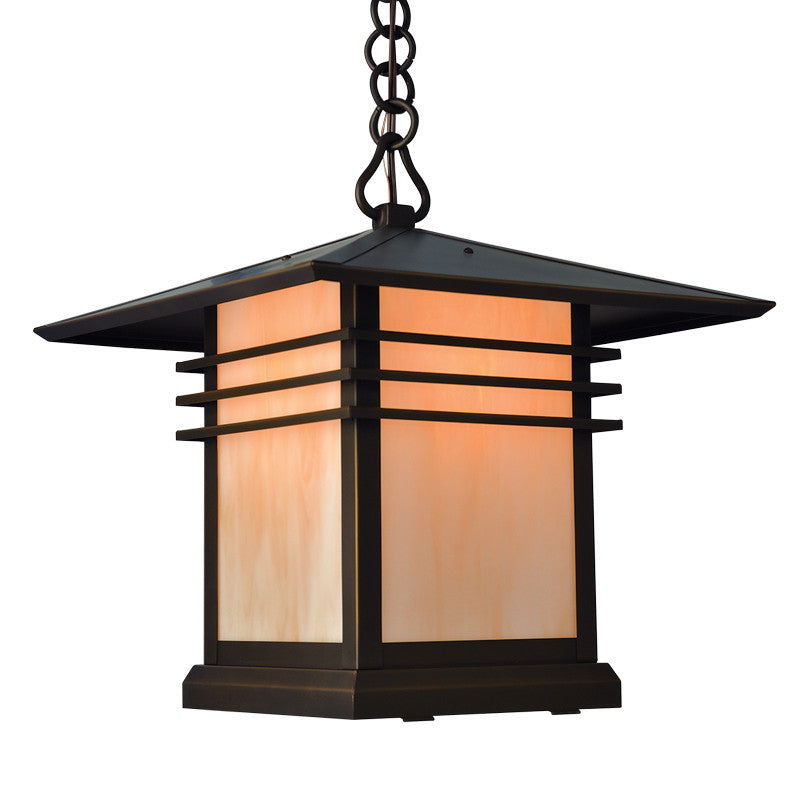 Decorative outdoor hanging light with black frame and glass panels on a white background