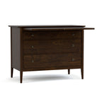 Dark wood dresser with three drawers.