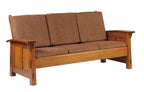 Brown wooden sofa with fabric cushions on a white background