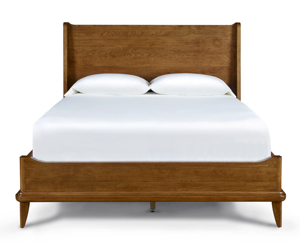 Wooden bed with white bedding on a white background