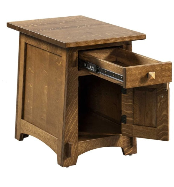 A rustic brown wooden side table or cabinet with a drawer pulled open to show the interior, photographed on a plain white background.