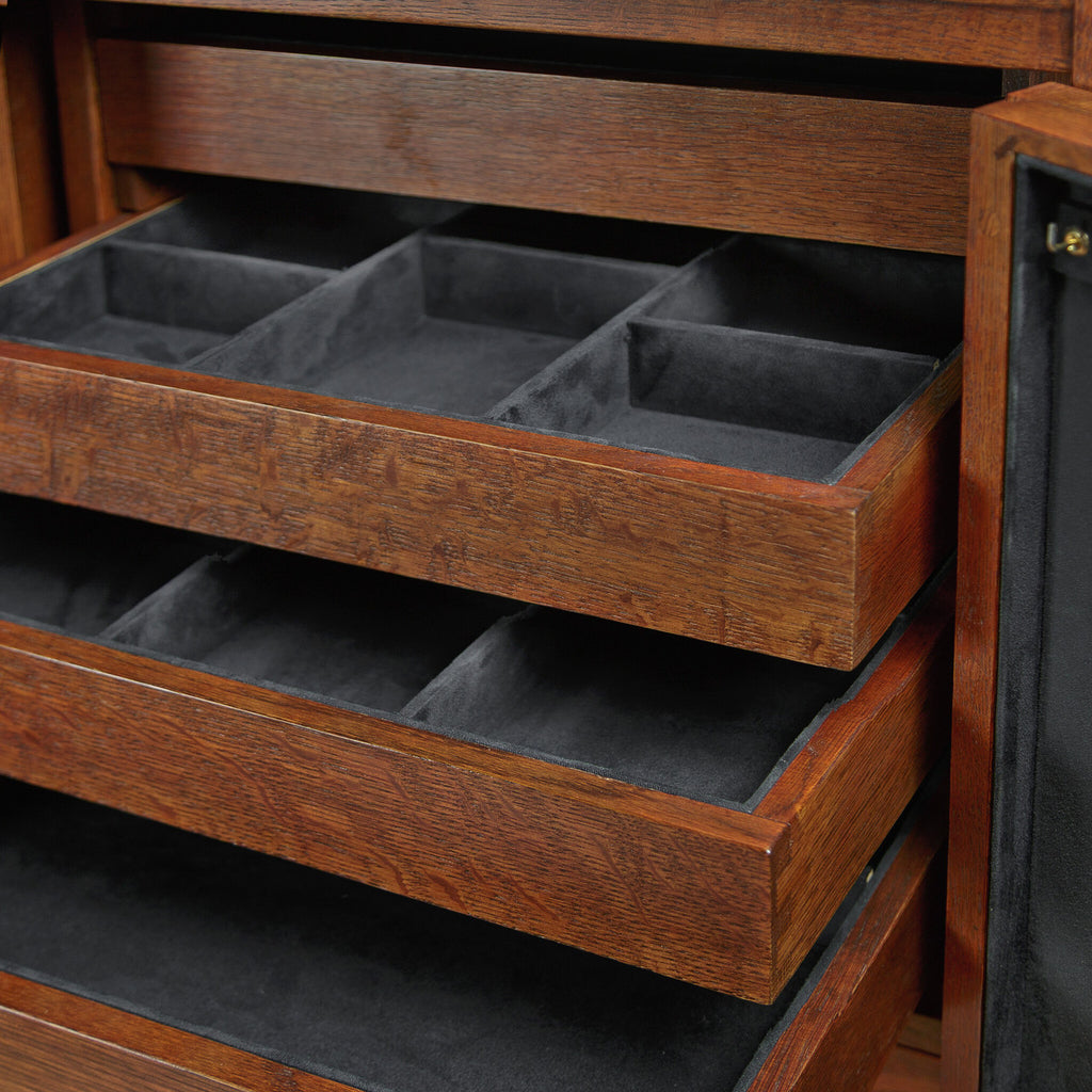 Wooden jewelry box with compartments and gray interior
