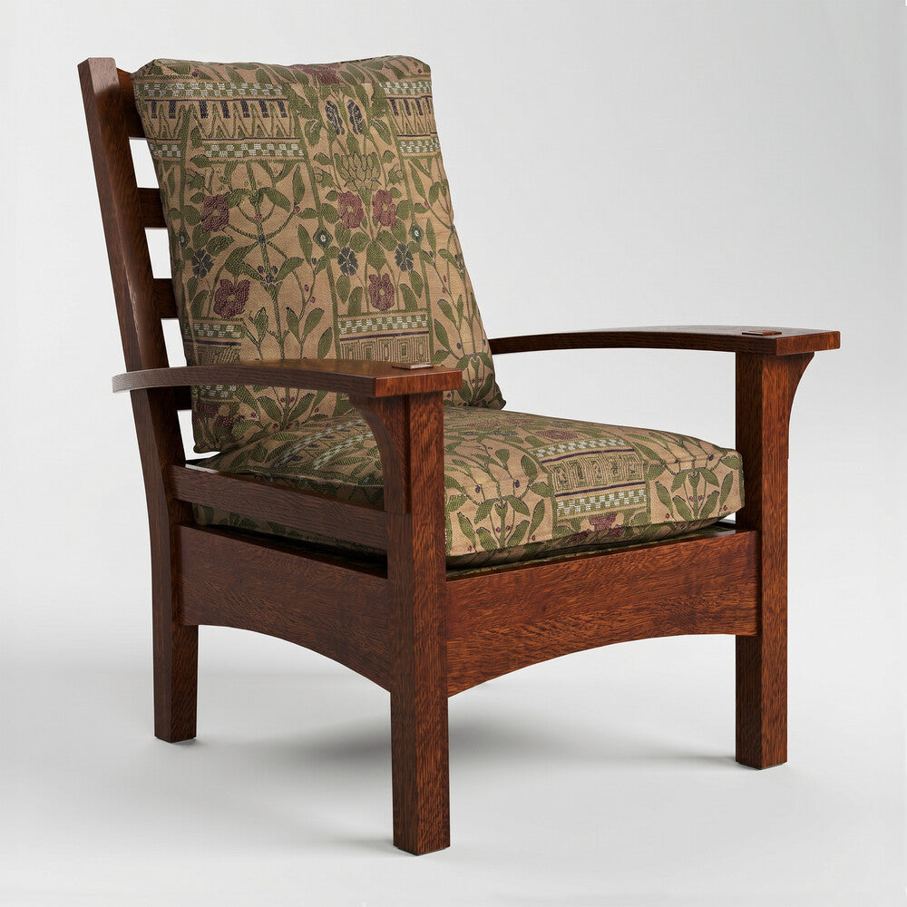Wooden armchair with patterned cushions on a white background