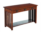Wooden console table with drawers and a shelf on a white background