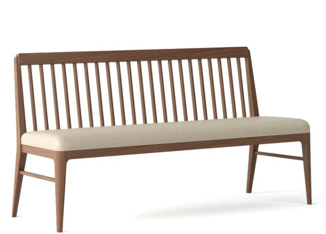 Wooden bench with beige cushion on a white background