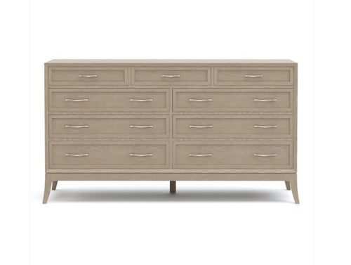 Beige dresser with multiple drawers on a white background