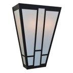 Decorative wall light fixture with black frame and glass panels on a white background