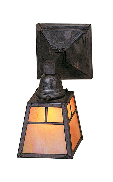 Vintage-style wall sconce with stained glass shade on a white background