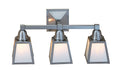 Three-light fixture with glass shades on a white background