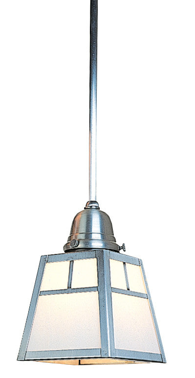 Pendant light with metallic fixture and glass shade on a white background