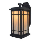 Black outdoor wall light fixture with glass panels on a white background