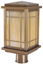 Decorative outdoor lamp with glass panel on a white background