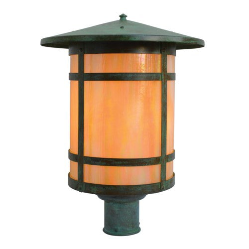 Decorative outdoor lamp with green top and orange cylindrical body on a white background