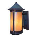 Decorative outdoor wall light with colorful glass shade on a white background
