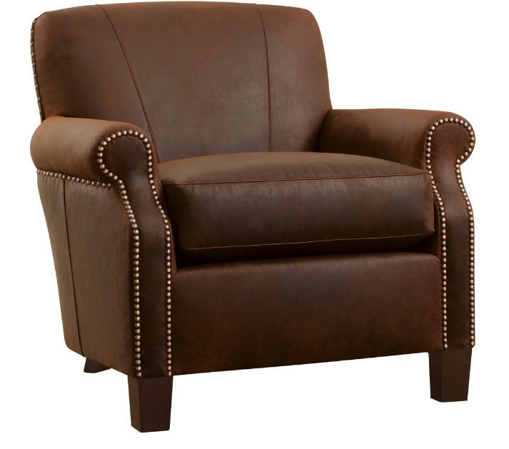 Brown leather armchair with nailhead trim on a white background