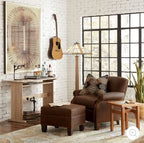 Living room with brown sofa, ottoman, and coffee table in front of a brick wall.