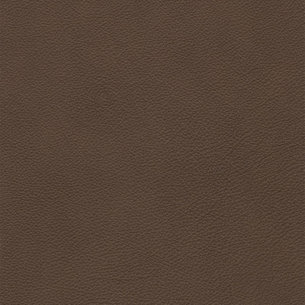 A close-up of a brown textured material, resembling pebbled leather or vinyl, filling the entire frame.