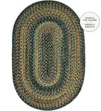 An oval braided area rug with concentric bands of dark green, black, tan, and brown, shown on a white background with a circular callout in the top right.