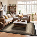 A large rectangular area rug with a braided geometric pattern in beige, brown, and black, styled in a bright, modern living room with a wooden sectional sofa and coffee table.