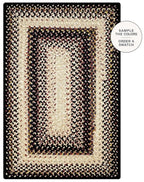 A rectangular braided area rug with concentric borders in black, beige, and cream tones, shown flat against a white background with a circular callout that reads 'SAMPLE THE COLORS ORDER A SWATCH'.