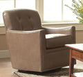 Brown leather armchair in a room with a wooden table and window.