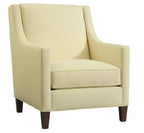 Beige armchair with wooden legs on a white background