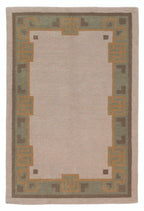 Beige area rug with geometric border design