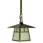 Green pendant light with stained glass on a white background