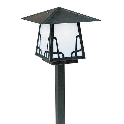 Black outdoor lamp post with a clear glass shade on a white background