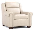 A high-back upholstered armchair in a light beige fabric, featuring dark brown wooden feet, shown against a plain white background.