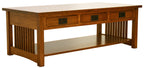 Wooden table with three drawers and a shelf on a white background
