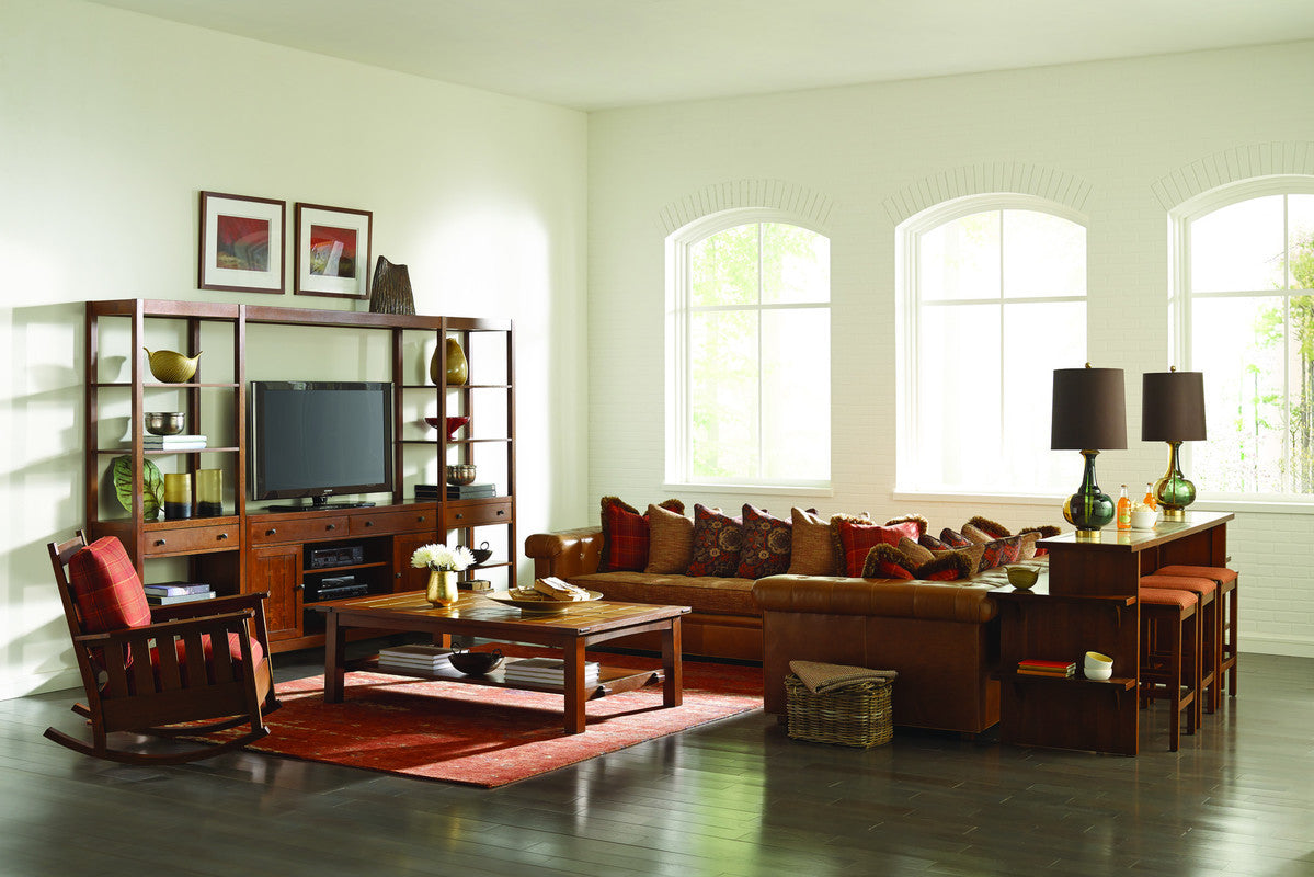 Living room with wooden furniture, TV, and decor