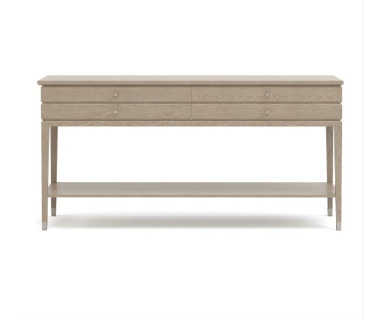 Light wood console table with drawers on a white background