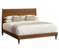 A modern wooden bed frame with a slanted headboard and footboard, styled with white bedding, textured beige pillows, and a beige throw blanket, shown against a plain white background.