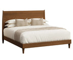 A modern wooden bed frame with a slanted headboard and footboard, styled with white bedding, textured beige pillows, and a beige throw blanket, shown against a plain white background.