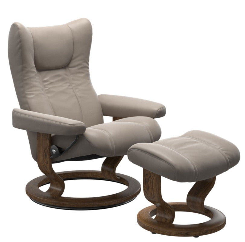 Beige recliner chair with wooden base and matching ottoman on a white background