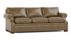 A three-seater leather sofa in a warm taupe-brown color, featuring rolled arms, deep seat cushions, and nailhead trim along the front, shown against a plain white background.
