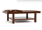 A modern wooden coffee table with a dark brown finish, featuring a top tray, a lower shelf, and a rectangular inset on the right side, shown against a plain white background.
