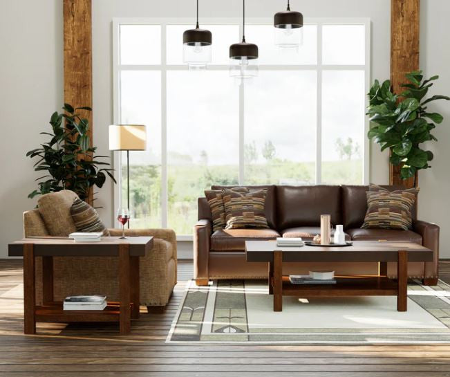 Living room with brown leather sofa, armchair, and wooden coffee table.